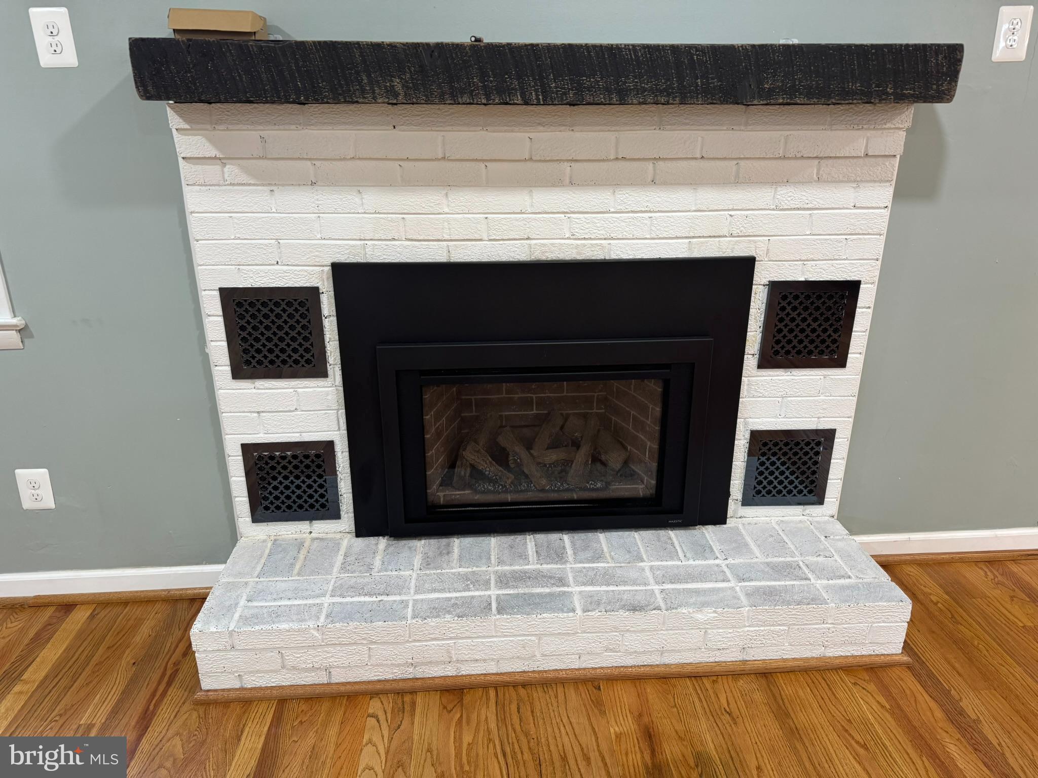 10012 Ellis Road Manassas, VA 20111 - Photo 6 of 71 a living room with a fireplace
