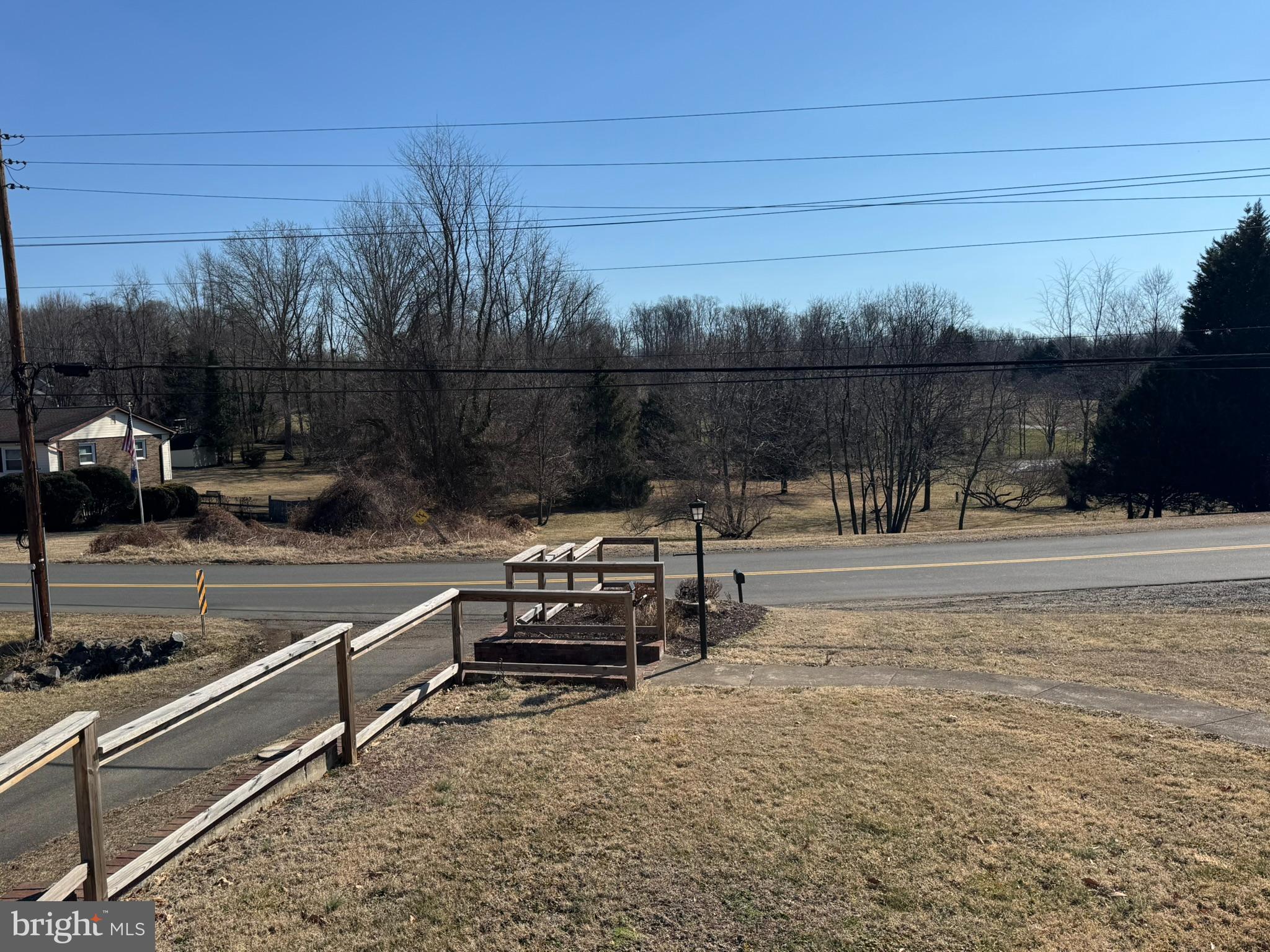 10012 Ellis Road Manassas, VA 20111 - Photo 66 of 71 a view of a terrace with a bench