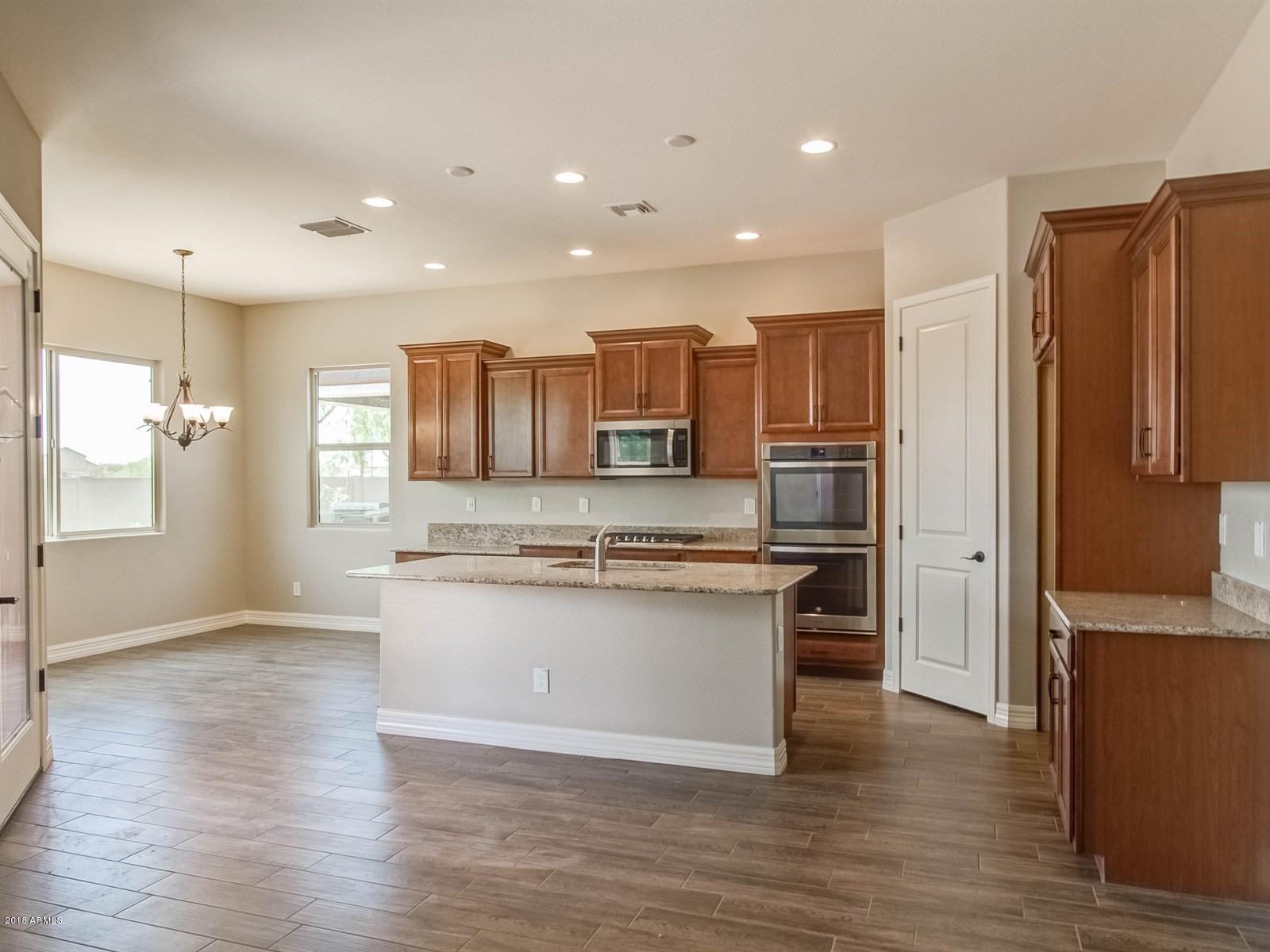 42941 West Mallard Road Maricopa, AZ 85138 - Photo 8 of 14 008_KitchenDining Room