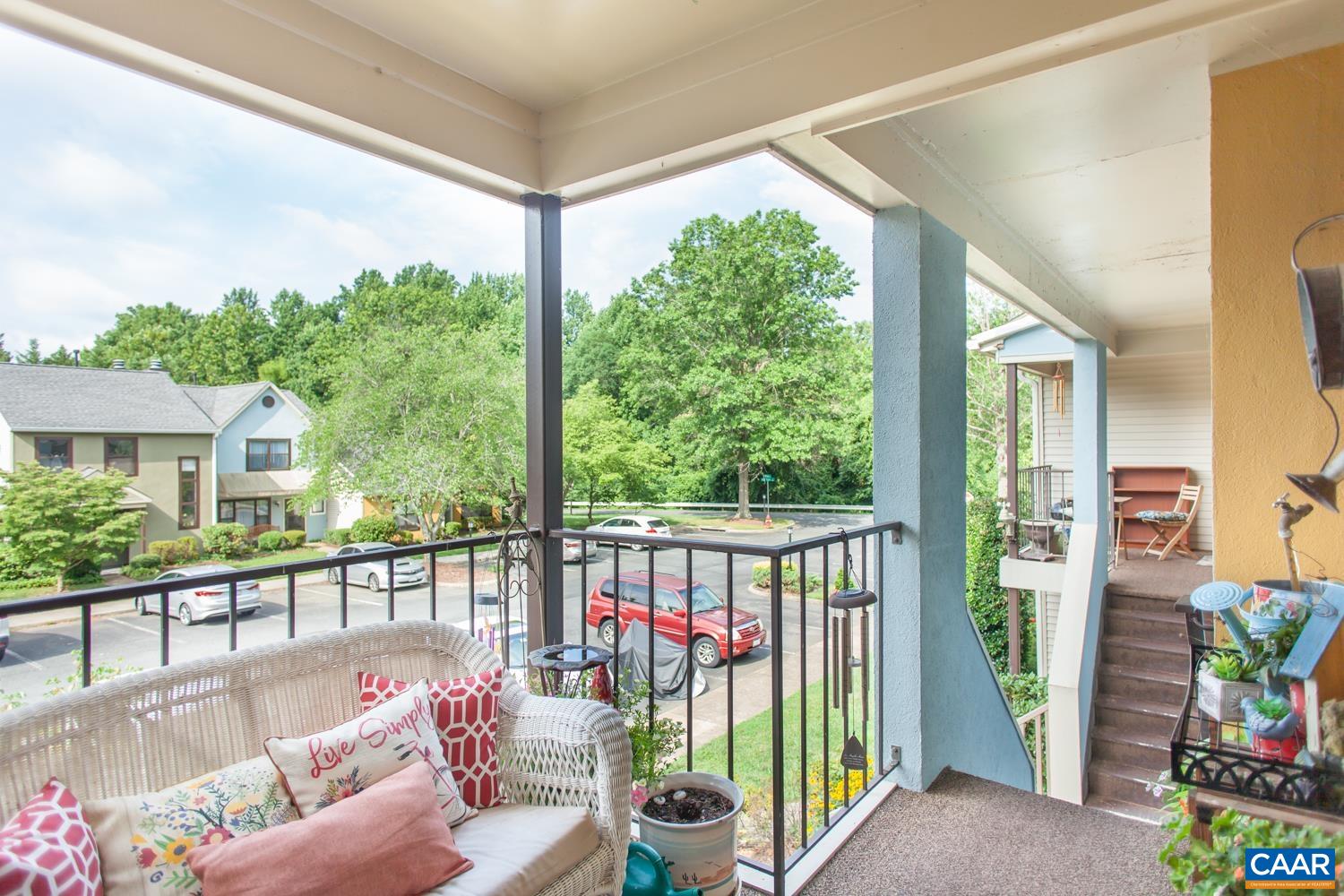 562 Millstone Court Charlottesville, VA 22901 - Photo 5 of 31 a balcony with furniture and garden view