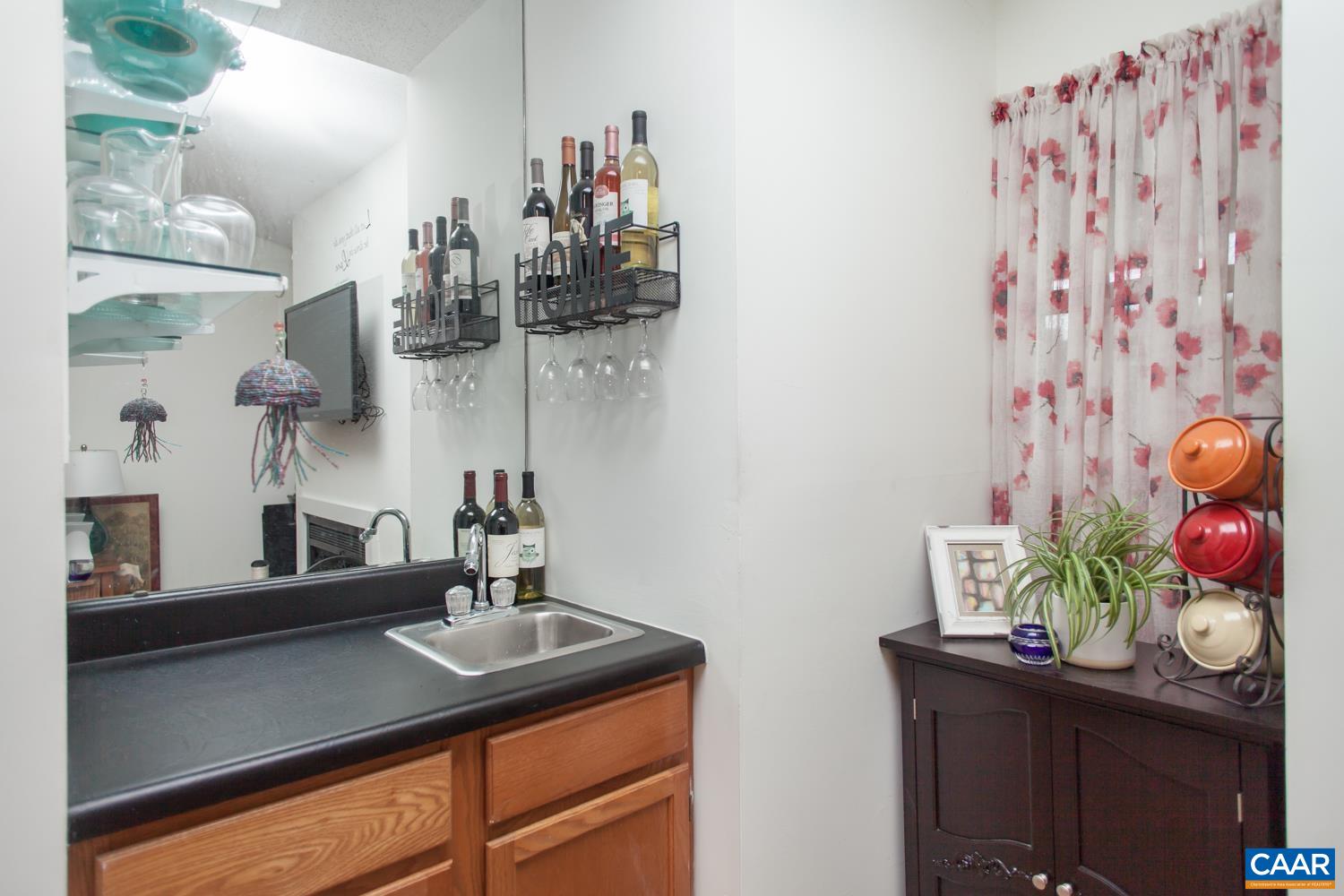 562 Millstone Court Charlottesville, VA 22901 - Photo 7 of 31 a room with a sink and cabinets