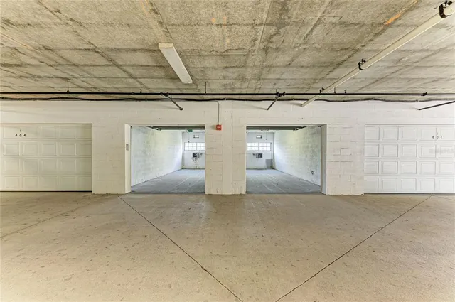 a view of swimming pool with chairs