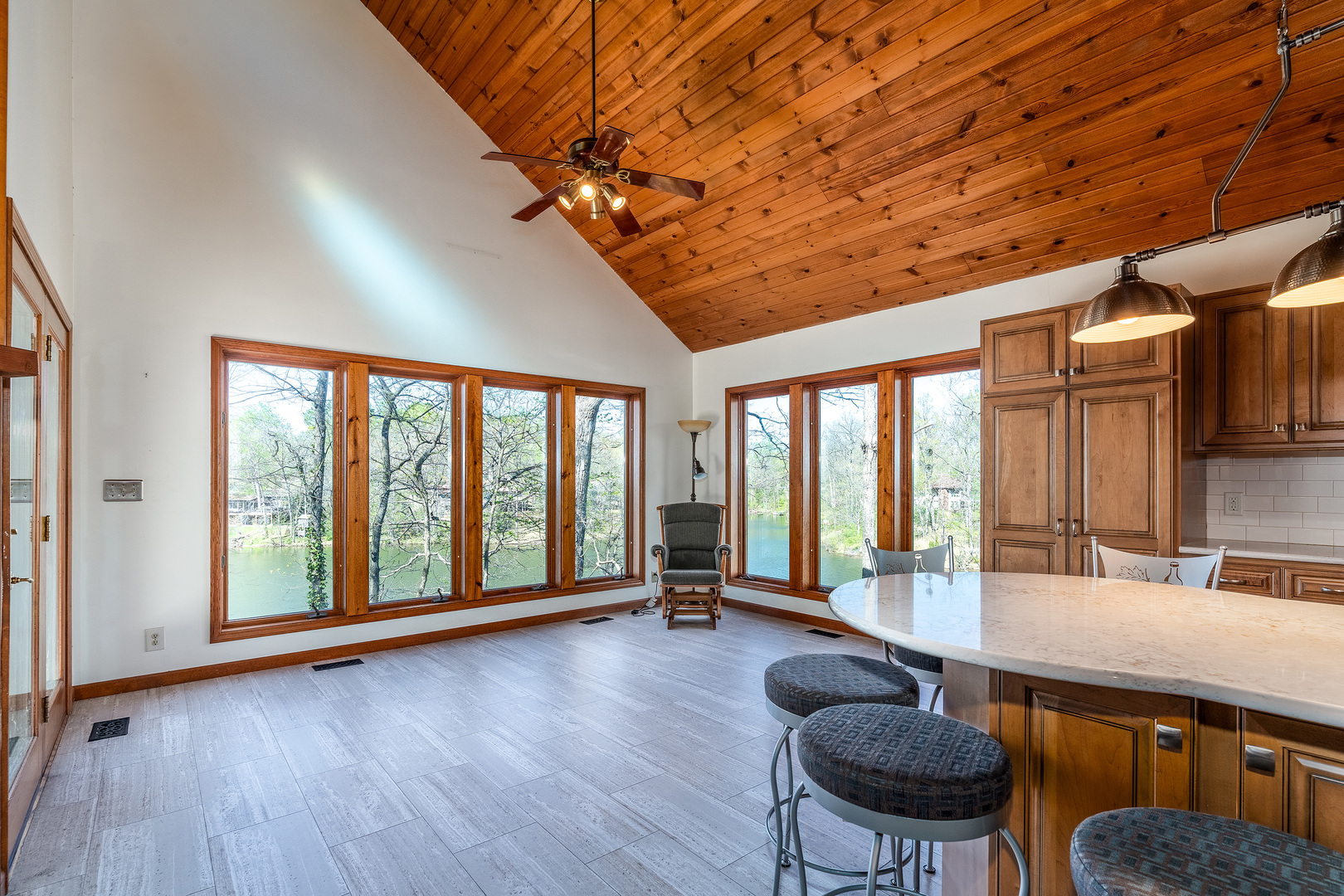 5 Lake Shore Court Carbondale, IL 62902 - Photo 13 of 50 a living room with furniture large windows and wooden floor