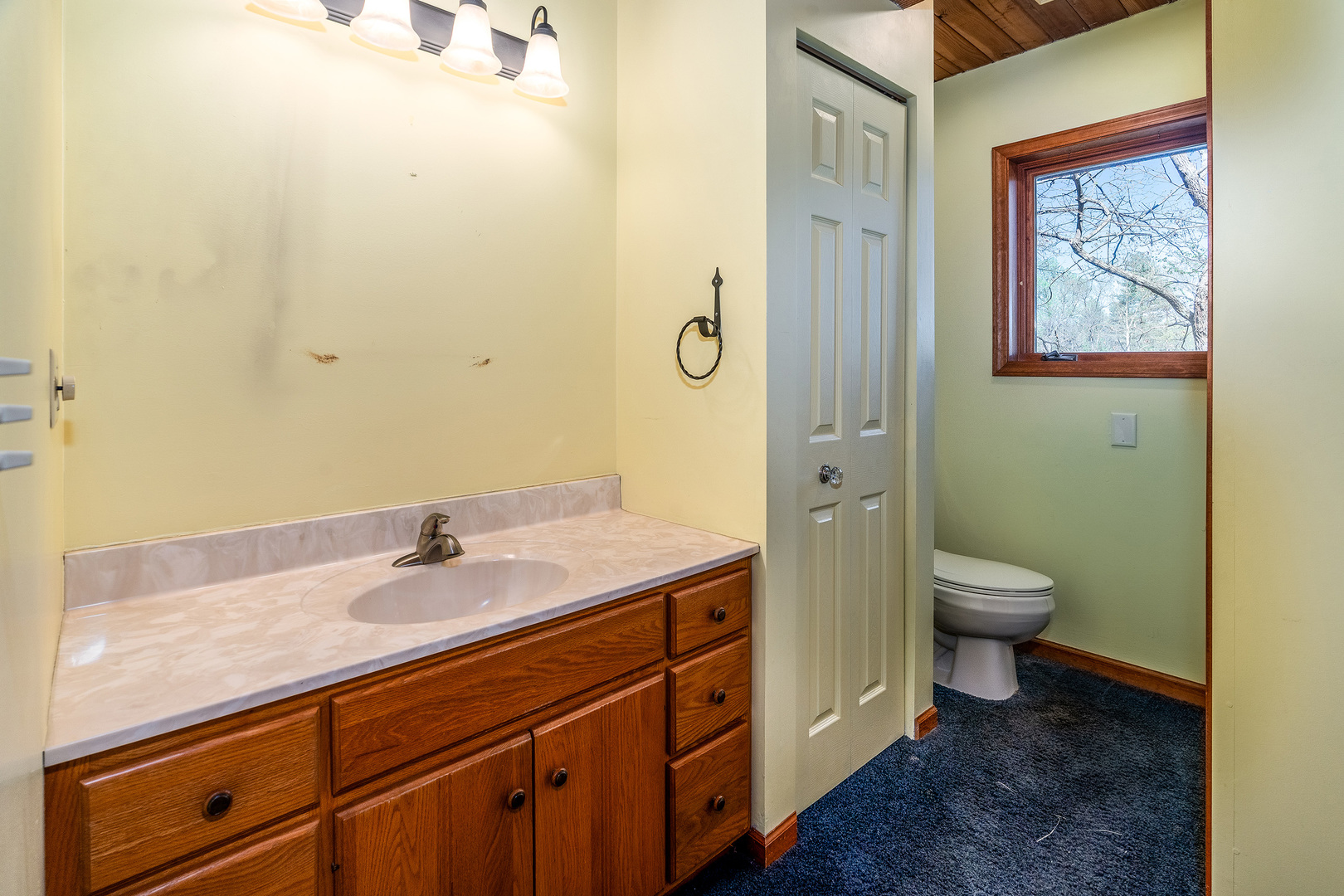 5 Lake Shore Court Carbondale, IL 62902 - Photo 27 of 50 a bathroom with a granite countertop sink toilet and shower