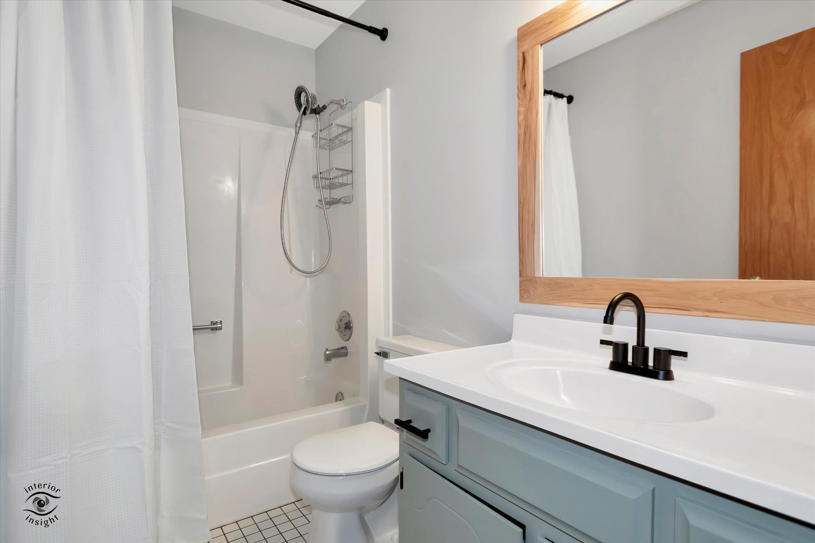 7507 West Tartan Road Frankfort, IL 60423 - Photo 16 of 25 a bathroom with a sink a toilet and shower