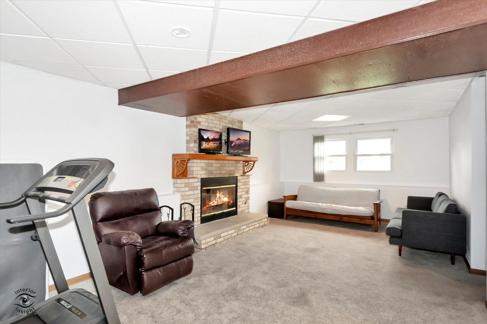 7507 West Tartan Road Frankfort, IL 60423 - Photo 18 of 25 a living room with furniture and a fireplace