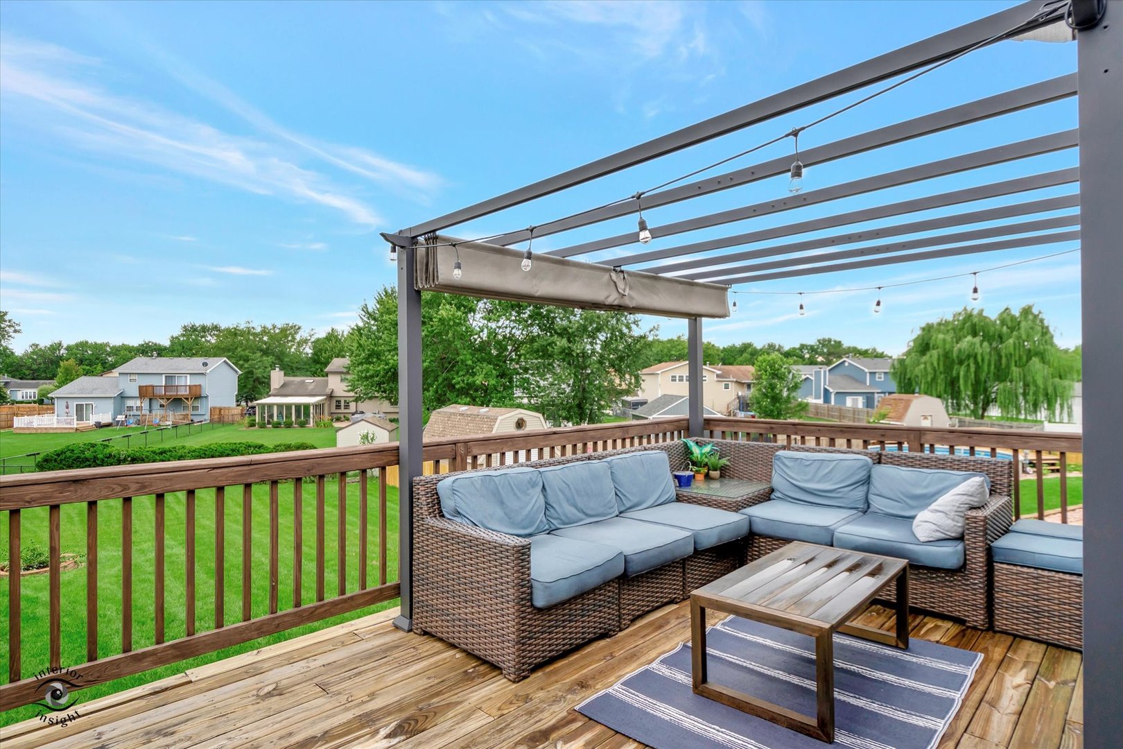 7507 West Tartan Road Frankfort, IL 60423 - Photo 20 of 25 a view of roof deck with couches and wooden floor