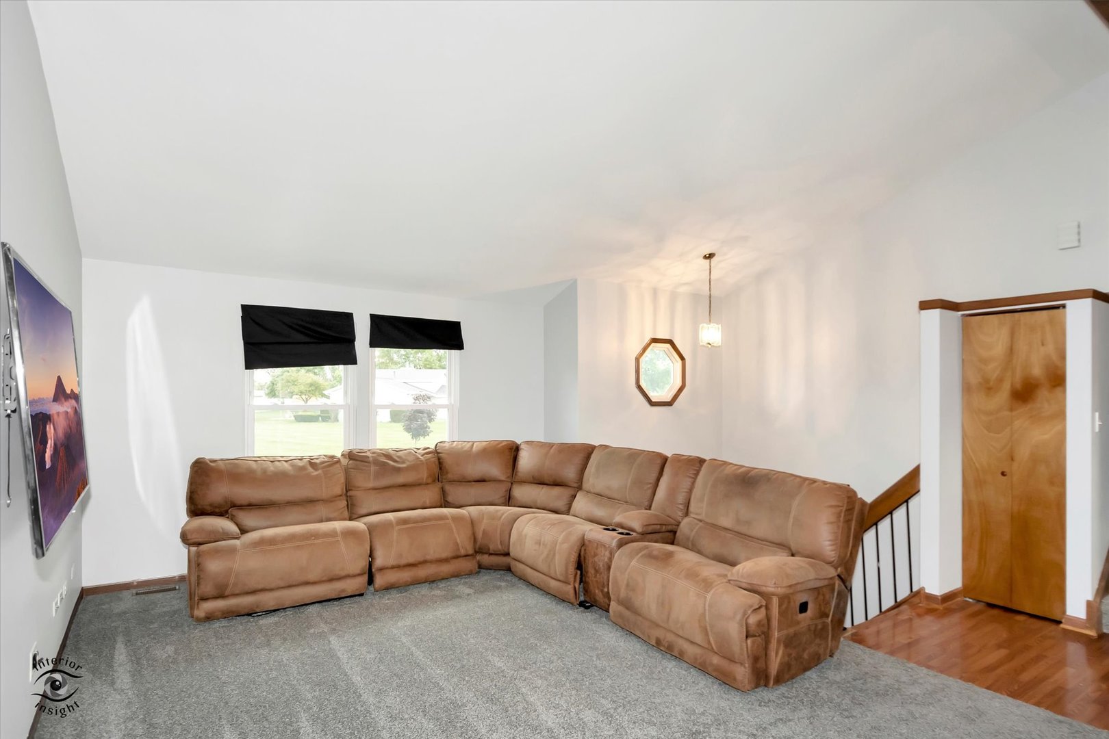 7507 West Tartan Road Frankfort, IL 60423 - Photo 3 of 25 a living room with a couch and a window
