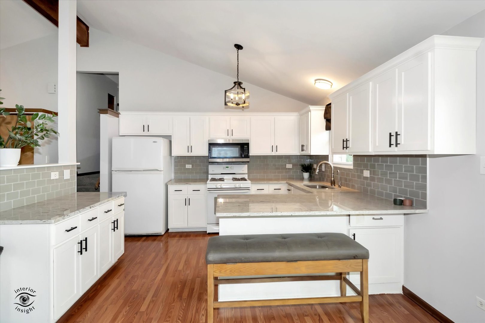 7507 West Tartan Road Frankfort, IL 60423 - Photo 7 of 25 a kitchen with refrigerator cabinets and wooden floor