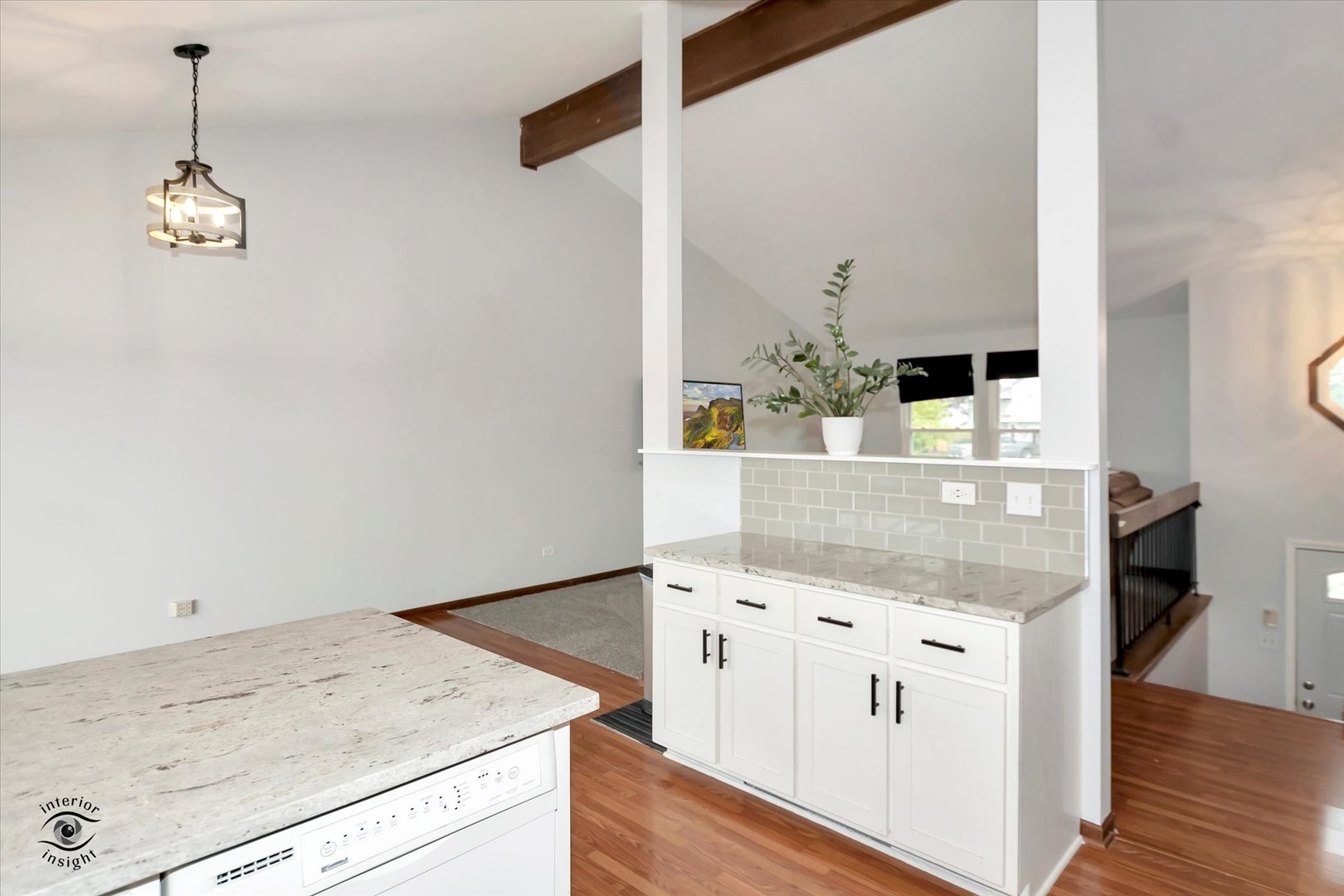 7507 West Tartan Road Frankfort, IL 60423 - Photo 9 of 25 a kitchen with a stove cabinets and wooden floor