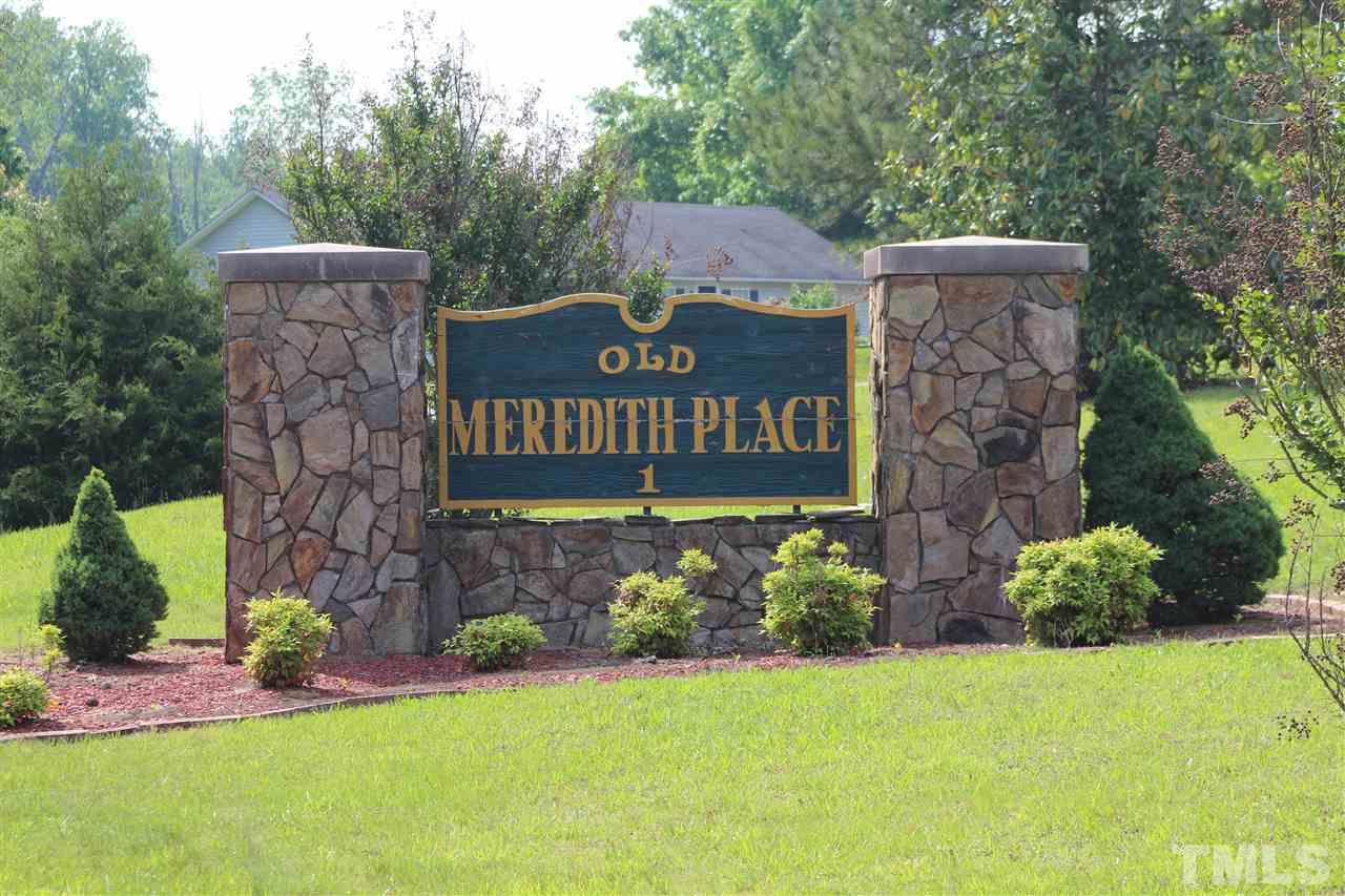 Lot 27 East Pool Road Rougemont, NC 27572 - Photo 1 of 3 a sign that is sitting in front of a brick wall