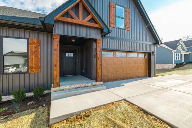 a front view of a house having yard