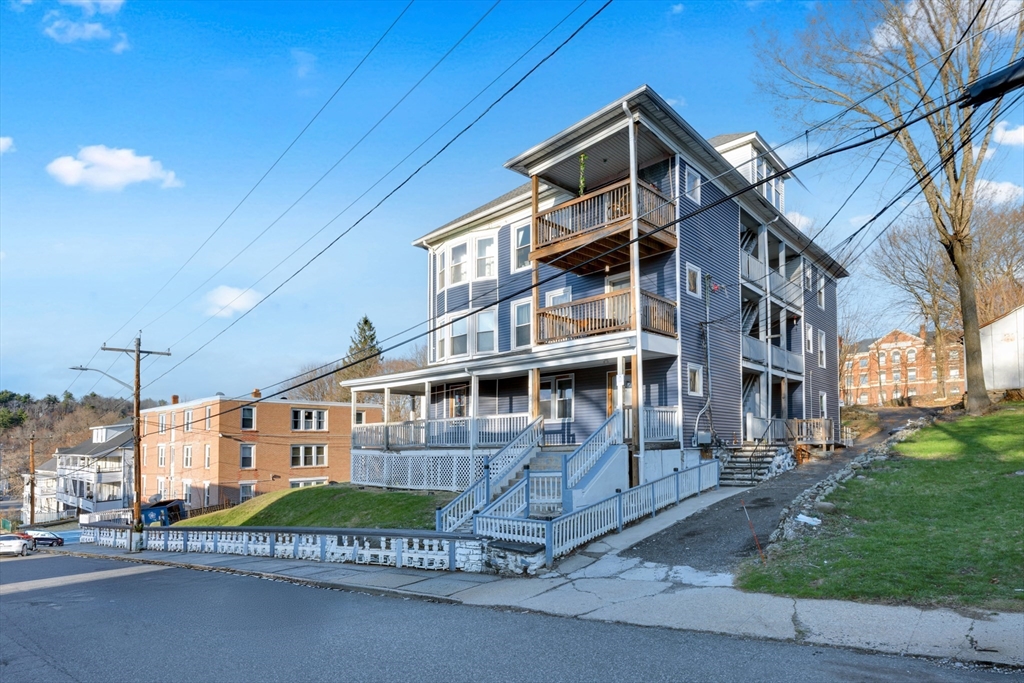 a view of a building with a street