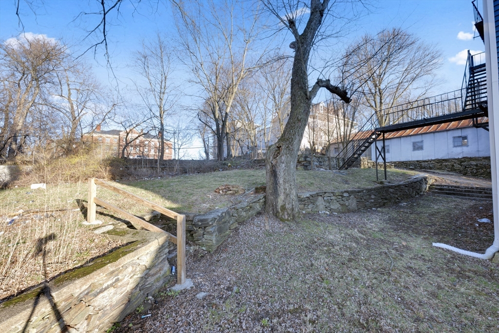 99 Cross Street Southbridge, MA 01550 - Photo 20 of 20 a view of a yard with a tree