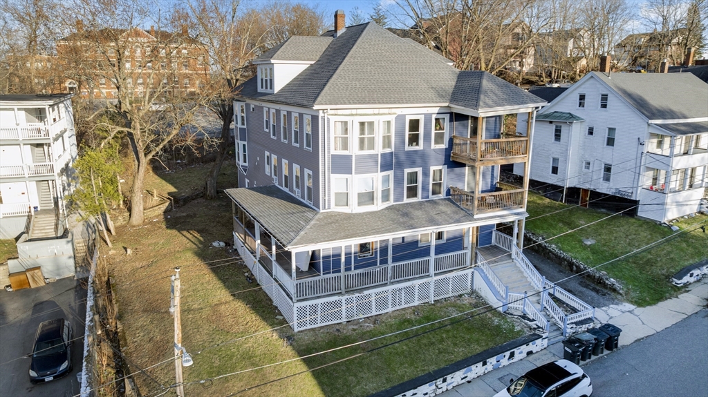 99 Cross Street Southbridge, MA 01550 - Photo 6 of 20 front view of a house with a yard