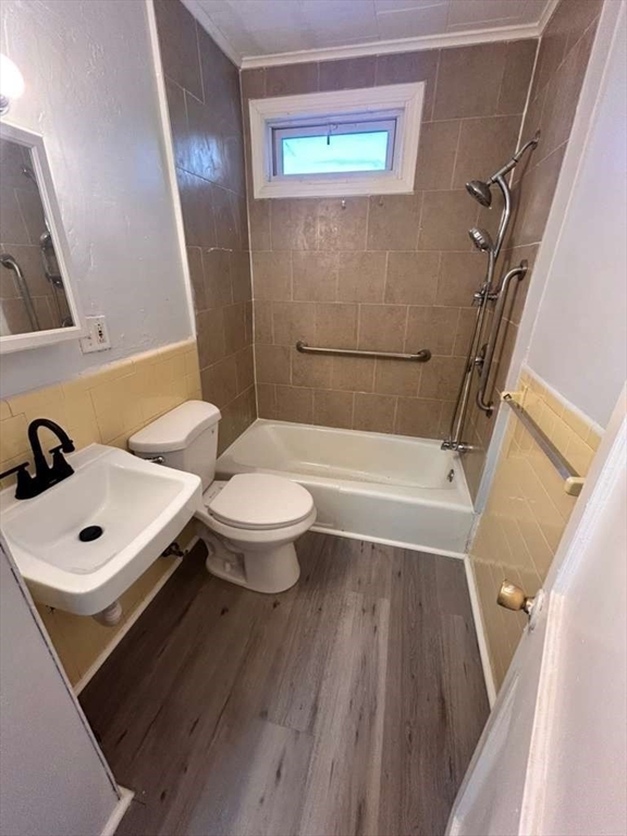 99 Cross Street Southbridge, MA 01550 - Photo 10 of 20 a bathroom with a sink a toilet a mirror and shower