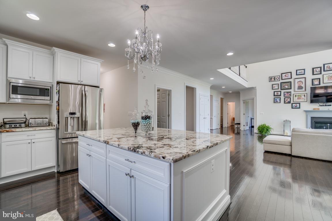 8585 Sinclair Mill Road Manassas, VA 20112 - Photo 11 of 38 Gourmet kitchen opens to family room
