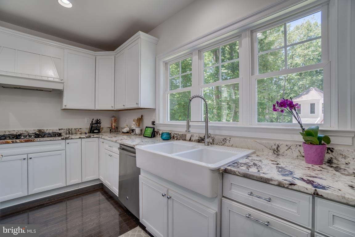 8585 Sinclair Mill Road Manassas, VA 20112 - Photo 12 of 38 Large window, granite counter tops, farmhouse sink