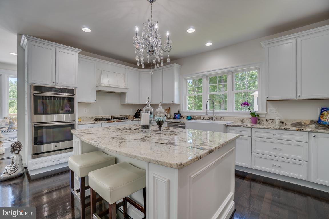 8585 Sinclair Mill Road Manassas, VA 20112 - Photo 13 of 38 Oversize island, double oven, walk-in pantry