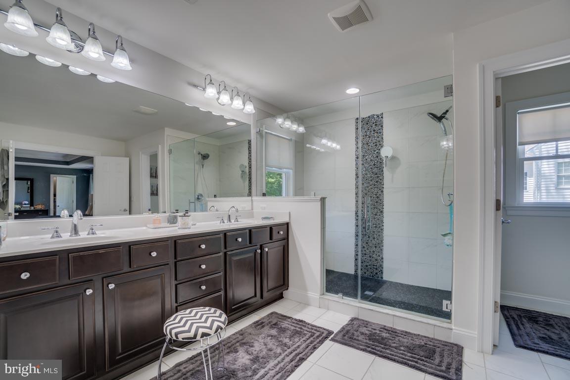 8585 Sinclair Mill Road Manassas, VA 20112 - Photo 19 of 38 Double vanity, walk-in shower