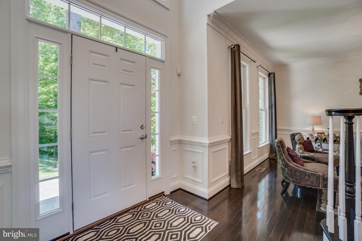 8585 Sinclair Mill Road Manassas, VA 20112 - Photo 5 of 38 Entry opens to beautiful staircase
