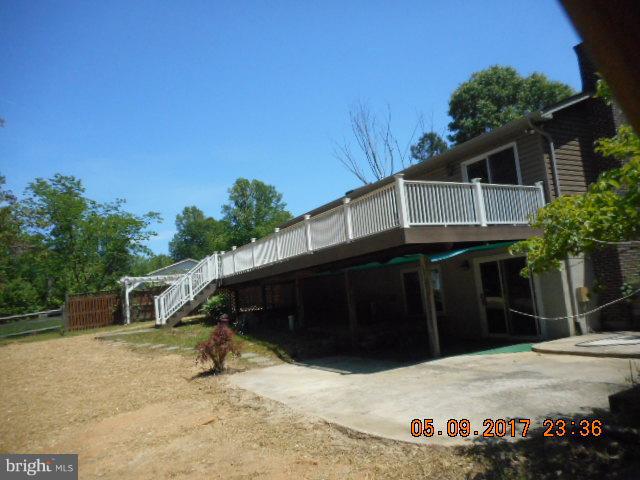 98 Wilson Road Huntingtown, MD 20639 - Photo 2 of 10 Back yard with large deck