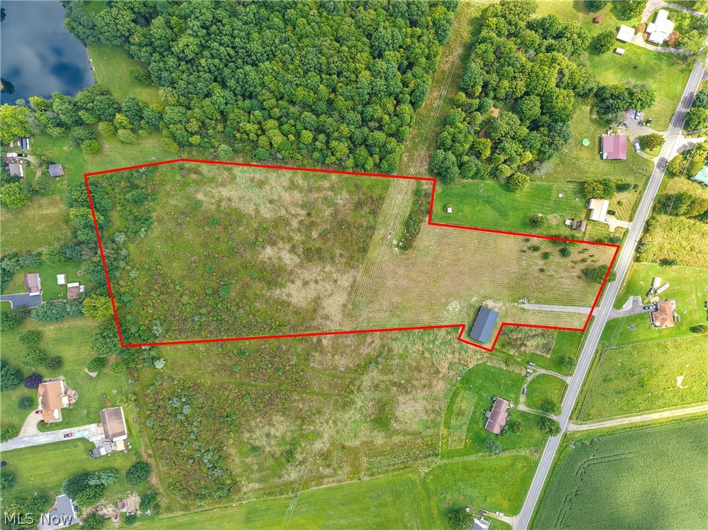 82 State Route Newton Falls, OH 44444 - Photo 25 of 30 Expansive land parcel featuring a visible building and adjacent to a water body