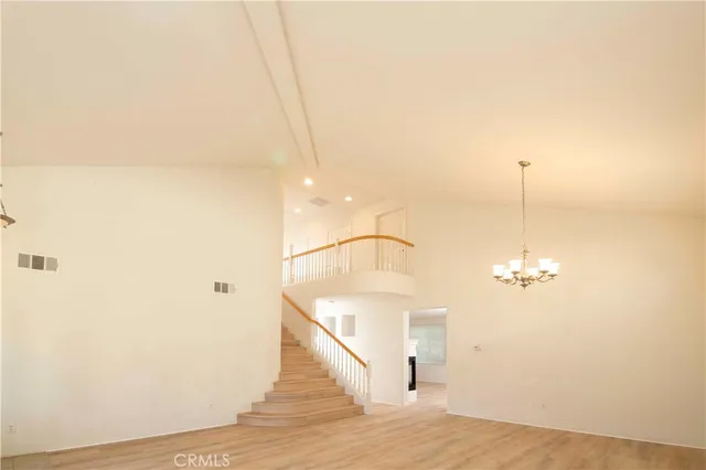 a view of a room that has a window in it