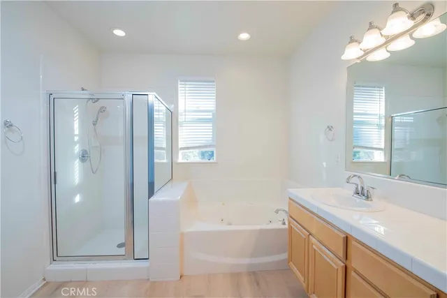 a bathroom with 2 sink and a mirror