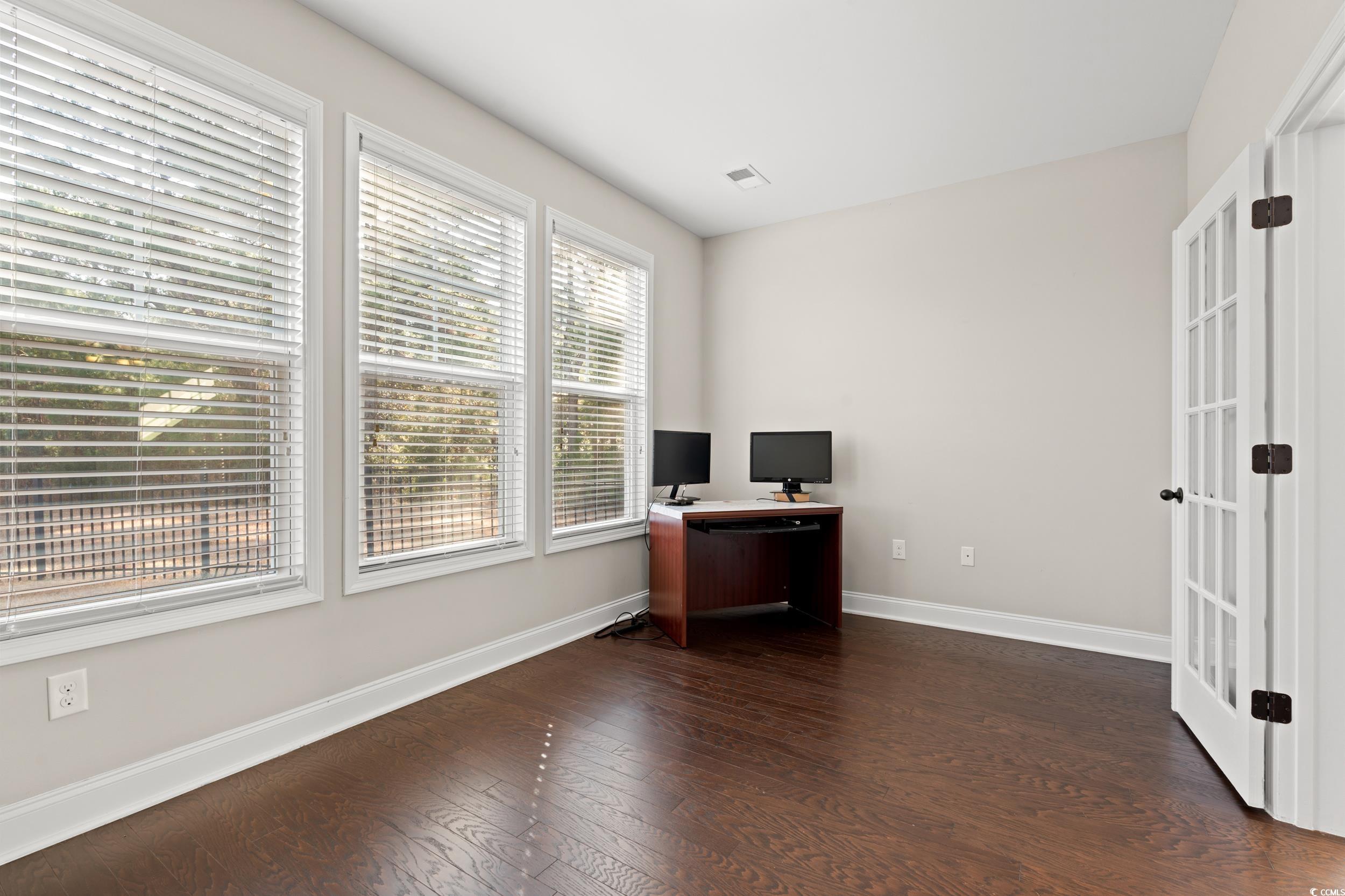 126 Viareggio Road Myrtle Beach, SC 29579 - Photo 14 of 40 Unfurnished office featuring baseboards and dark wood finished floors