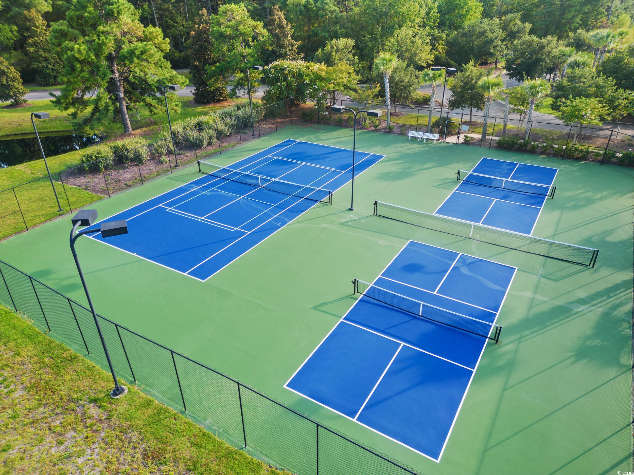 126 Viareggio Road Myrtle Beach, SC 29579 - Photo 36 of 40 View of tennis court with community basketball court