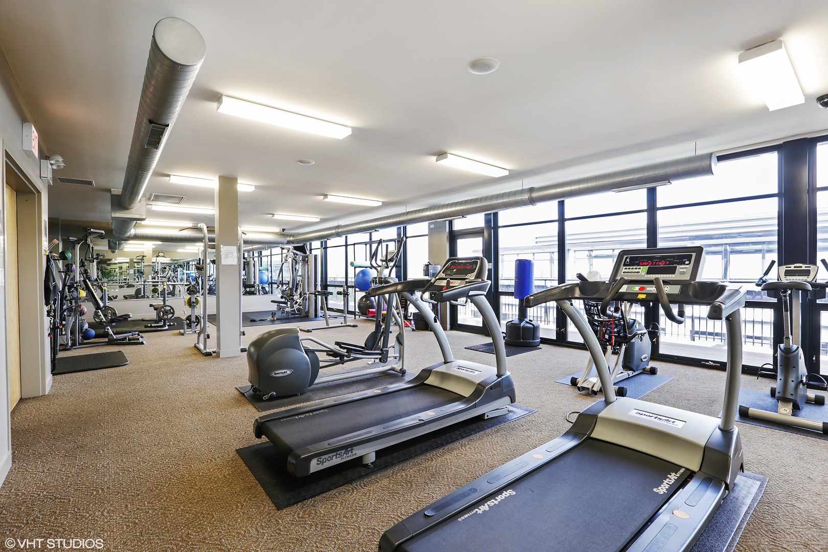 1110 West 15th Street, Unit 412 Chicago, IL 60608 - Photo 15 of 19 a view of a room with gym equipment