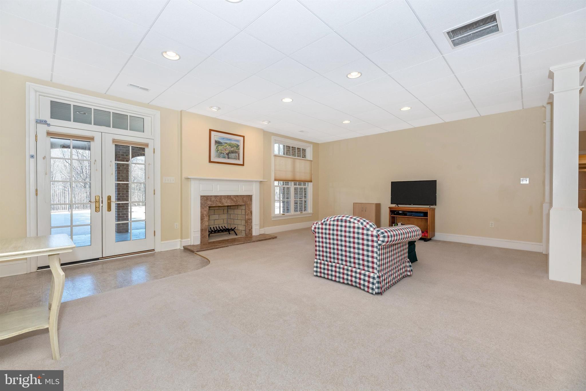 2926 Rohrersville Road Rohrersville, MD 21779 - Photo 38 of 63 Walkout lower level rec room with fireplace.