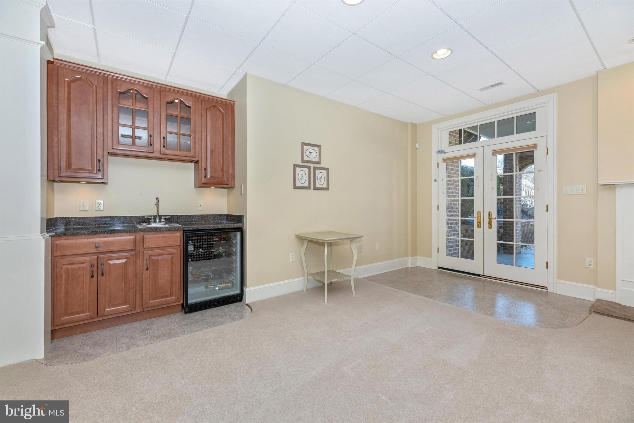 2926 Rohrersville Road Rohrersville, MD 21779 - Photo 39 of 63 Wet bar with wine fridge and doors to patio.