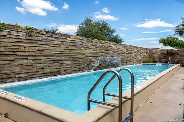 a view of a kitchen with swimming pool