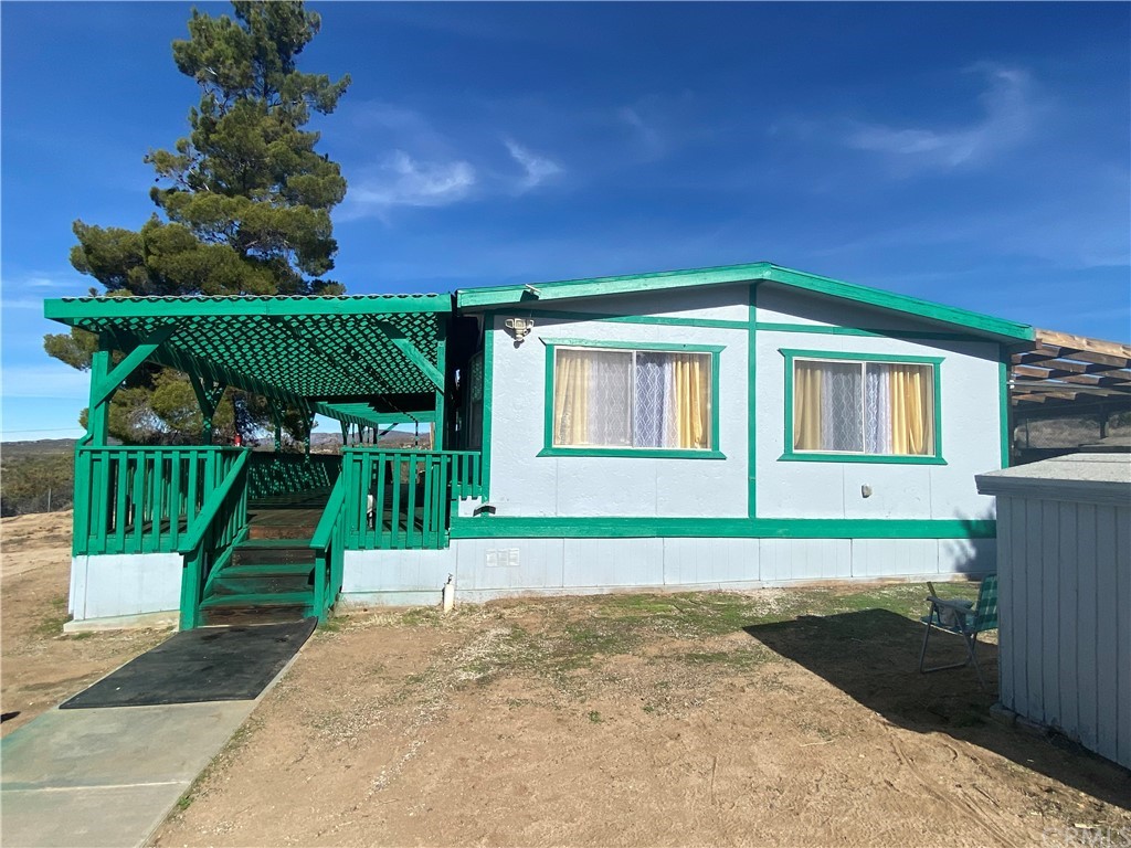39620 Howard Road Anza, CA 92539 - Photo 1 of 1 a front view of a house with a yard