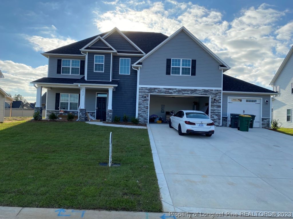 a house view with a garden space