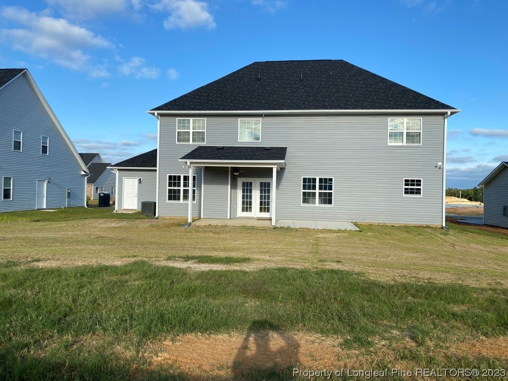 3026 Branscombe Road Fayetteville, NC 28304 - Photo 2 of 2 a front view of a house with garden