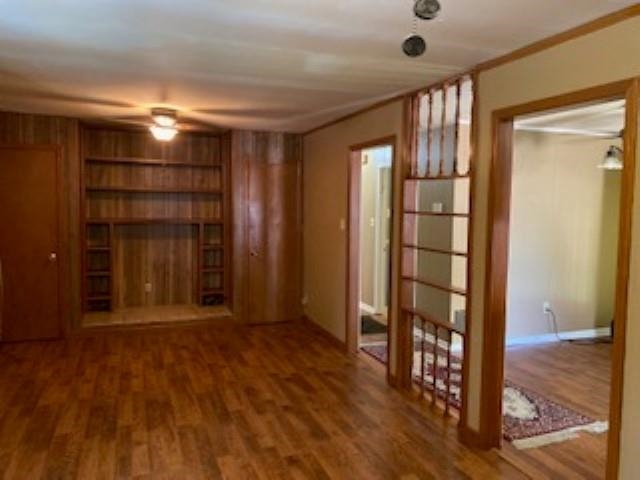 167 Frog Jump Road Brighton, TN 38011 - Photo 7 of 18 Unfurnished living room with hardwood / wood-style floors