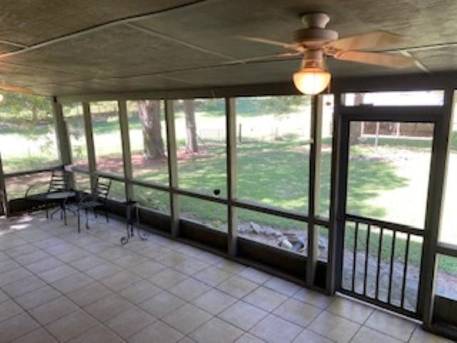 167 Frog Jump Road Brighton, TN 38011 - Photo 10 of 18 Unfurnished sunroom with ceiling fan