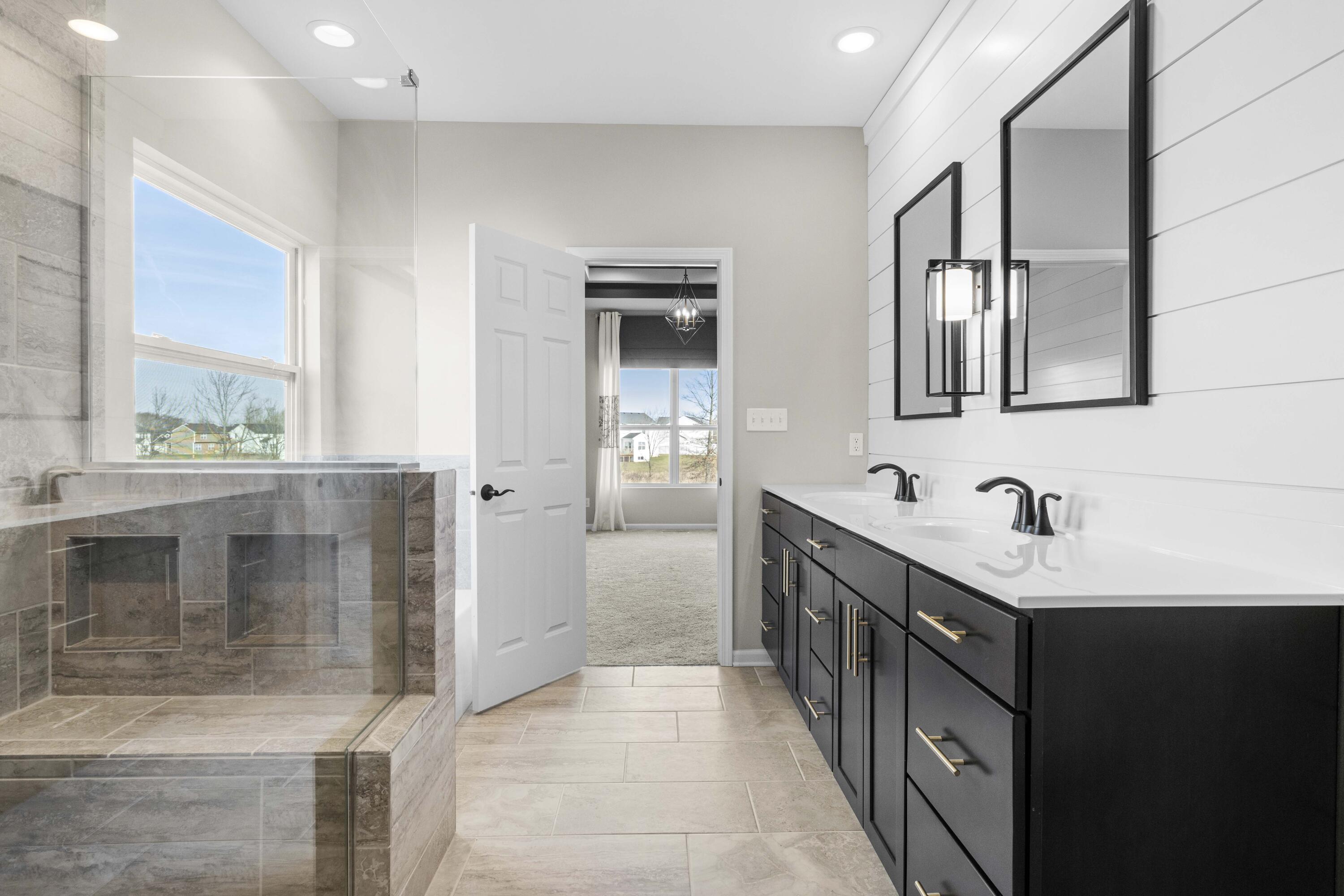 5652 Burr Rdg Circle Crown Point, IN 46307 - Photo 16 of 29 a bathroom with a sink a vanity and a mirror