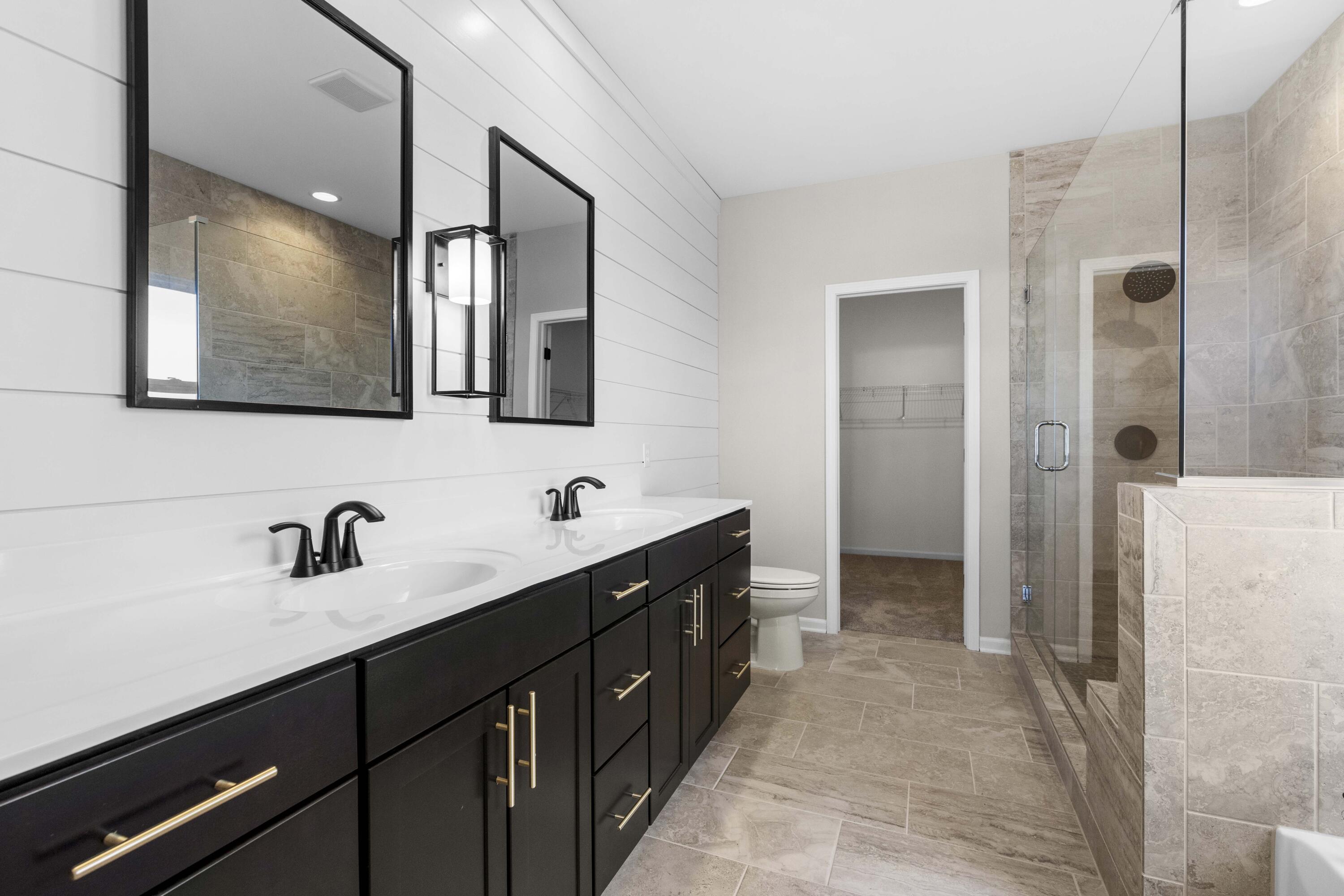 5652 Burr Rdg Circle Crown Point, IN 46307 - Photo 17 of 29 a bathroom with a double vanity sink and mirror
