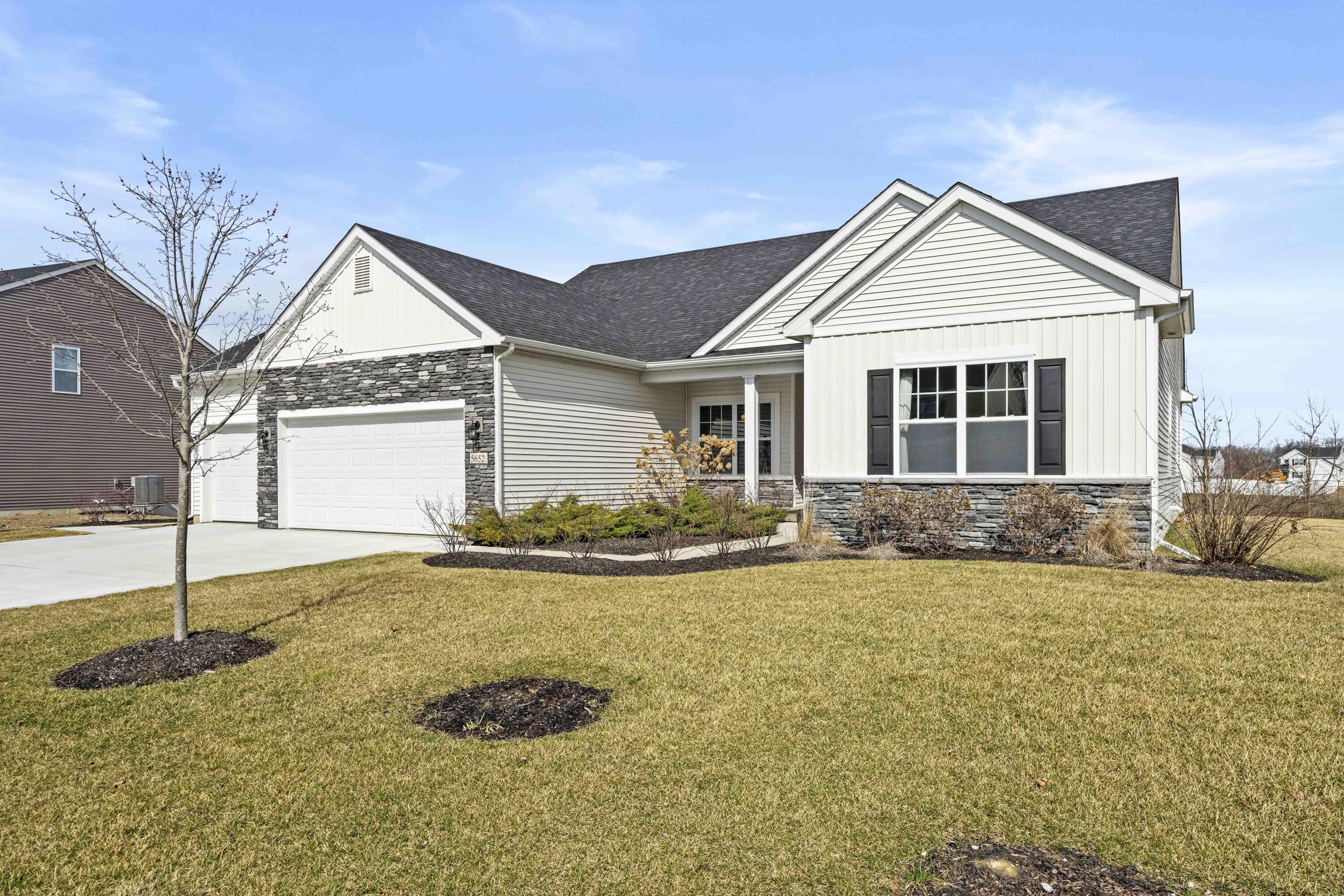 5652 Burr Rdg Circle Crown Point, IN 46307 - Photo 2 of 29 a front view of a house with a yard
