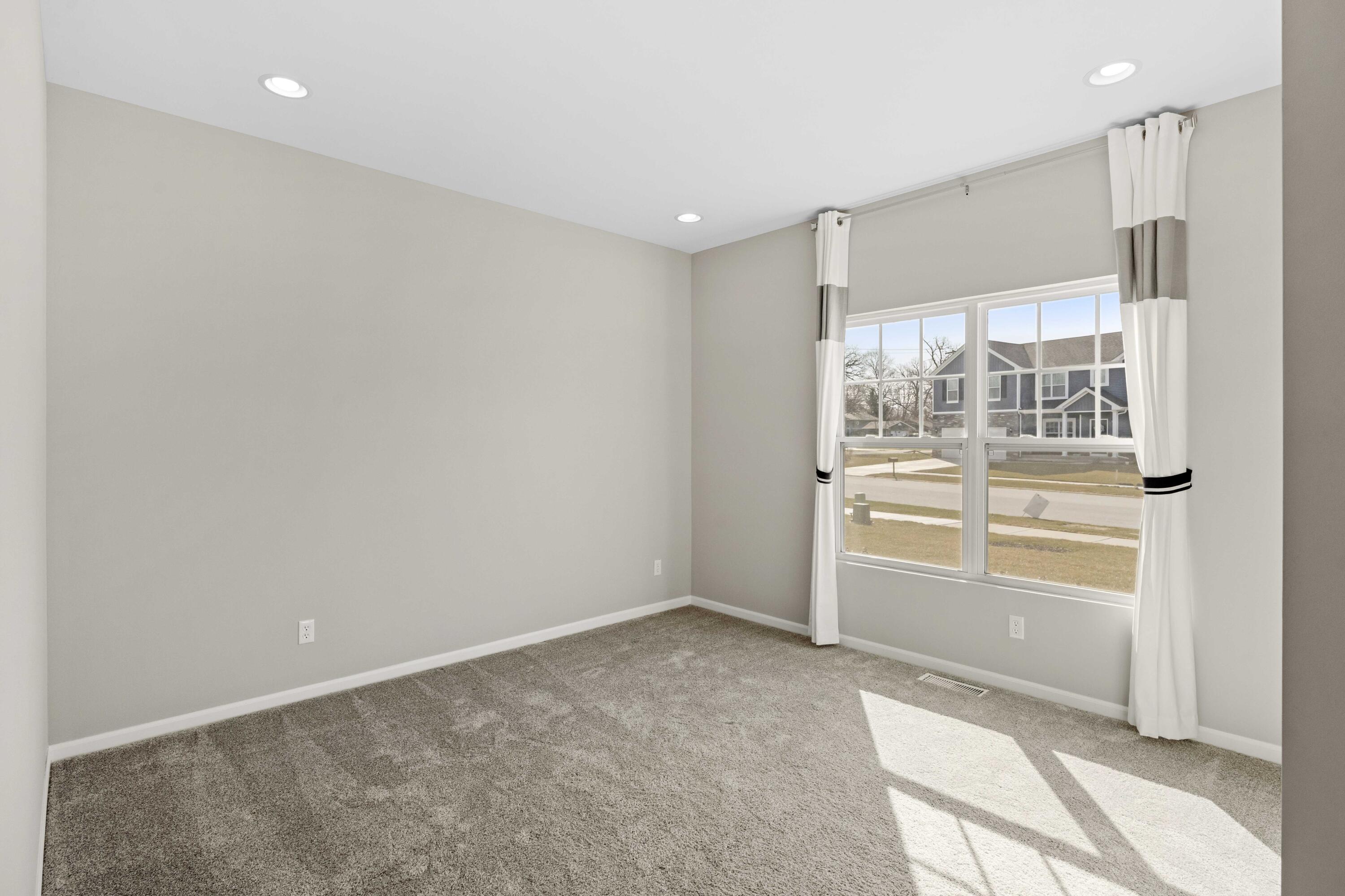 5652 Burr Rdg Circle Crown Point, IN 46307 - Photo 23 of 29 a view of an empty room with a window
