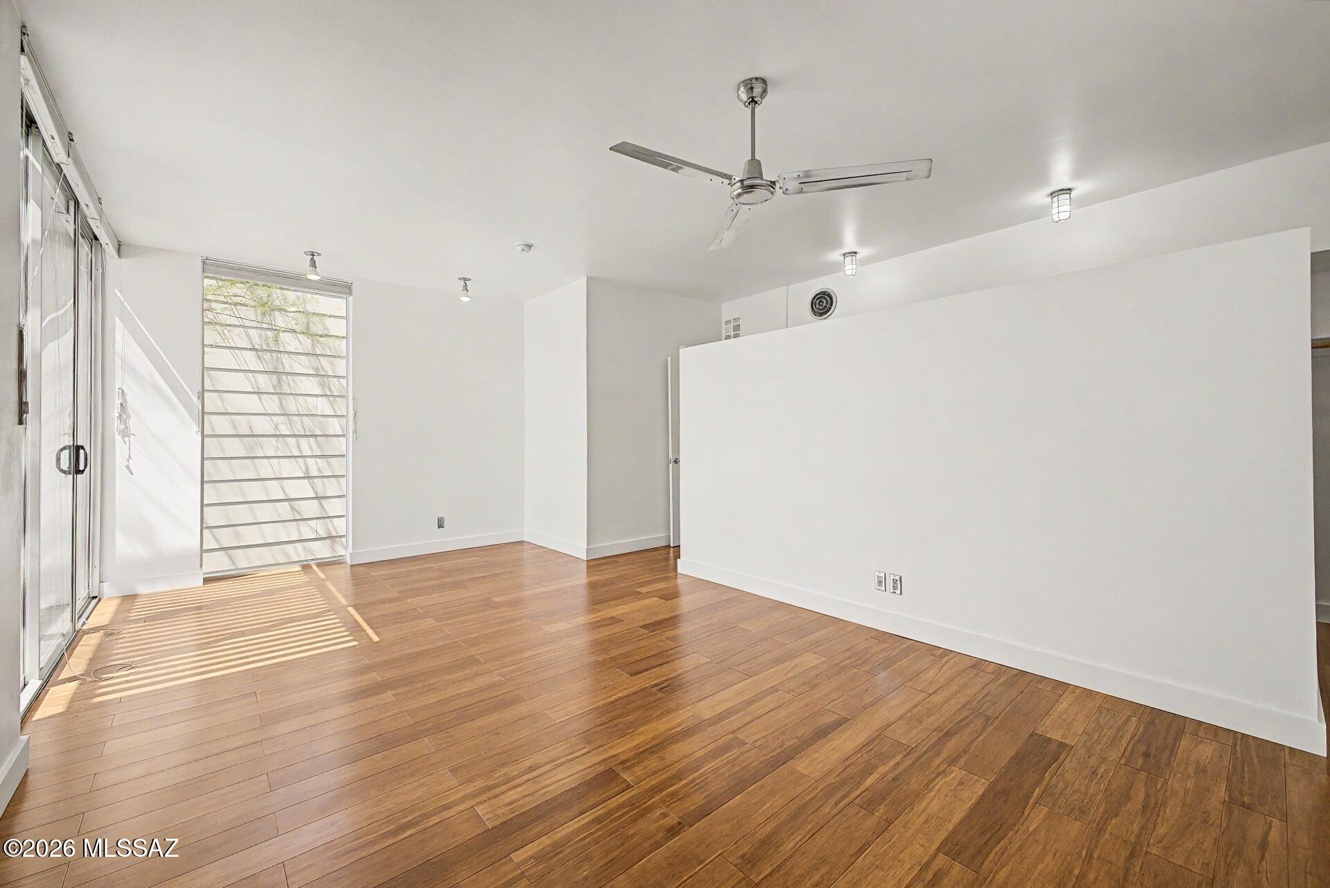 3605 East 3rd Street Tucson, AZ 85716 - Photo 18 of 39 This private primary bedroom is a true sanctuary. Featuring floor to ceiling windows and a covered balcony.