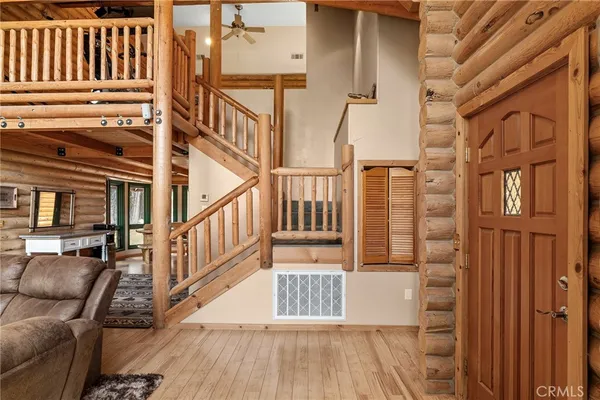 a view of a balcony with wooden floor