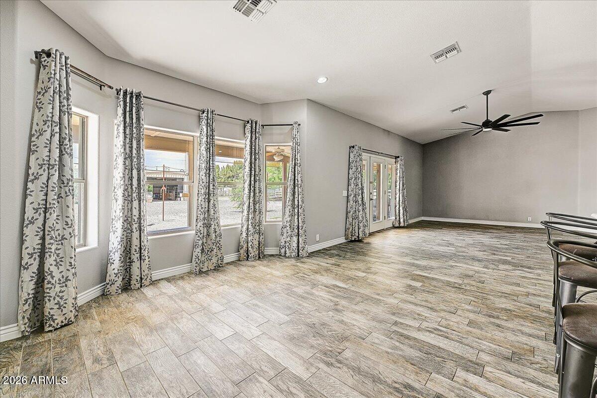 7624 North Citrus Road Waddell, AZ 85355 - Photo 13 of 57 a view of an empty room with a window