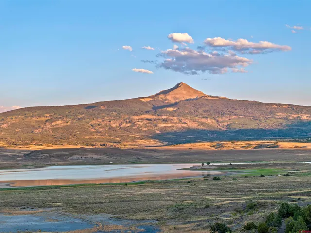 a view of a lake with a mountain