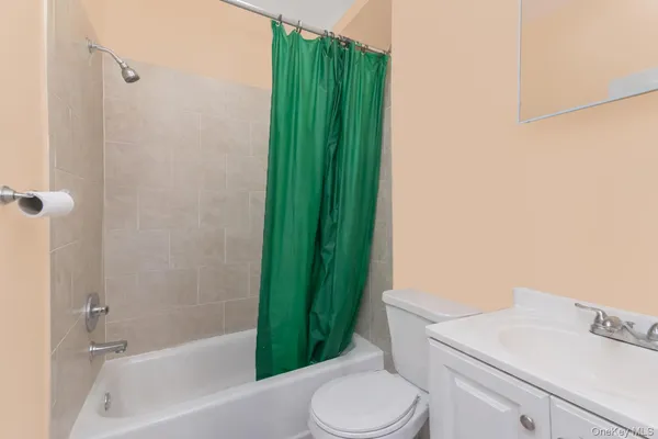 a bathroom with a sink a toilet and a bathtub