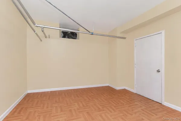 a view of a room with racks on the wall